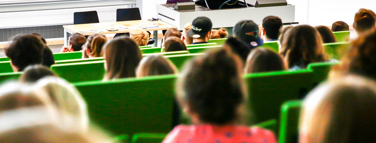 Students sitting in a lecture at the beginning of the study.